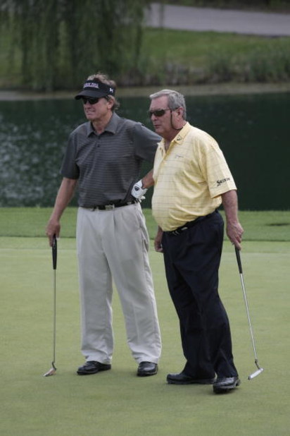 BIRMINGHAM, AL - MAY 14: South Carolina football coach Steve Spurrier (L) talks with Fuzzy Zoeller on the 4th hole during the Thursday Pro-AM of the Regions Charity Classic at the Robert Trent Jones Golf Trail at Ross Bridge on May 14, 2009  in Birmingham