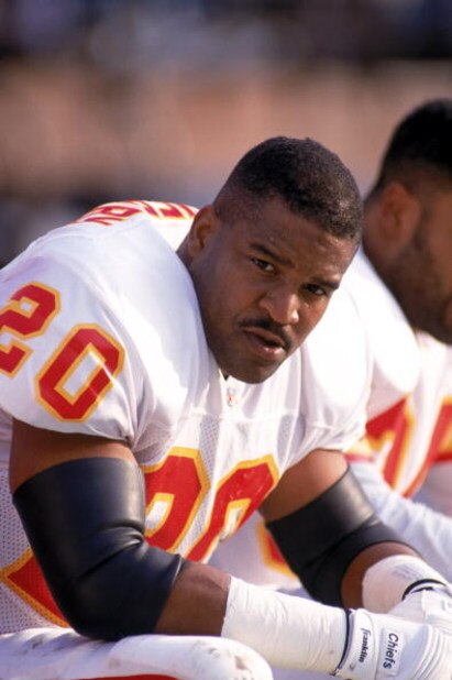 SAN FRANCISCO - DECEMBER 14: Defensive back Deron Cherry #20 of the Kansas City Chiefs takes a rest on the sideline bench during a game against the San Francisco 49ers at Candlestick Park on December 14, 1991 in San Francisco, California. The 49ers won