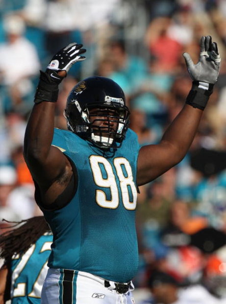JACKSONVILLE, FL - OCTOBER 26:  John Henderson #98 of the Jacksonville Jaguars asks the crowd for noise in a game against the Cleveland Browns at Jacksonville Muncipal Stadium on October 26, 2008 in Jacksonville, Florida.  (Photo by Sam Greenwood/Getty Im