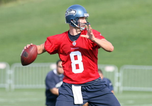 RENTON, WA - JULY 31:  Quarterback Matt Hasselbeck #8 passes the ball during training camp at the Seahawks training facility on July 31, 2009 in Renton, Washington. (Photo by Otto Greule Jr/Getty Images)