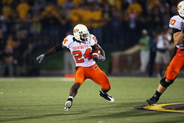 COLUMBIA, MO - OCTOBER 11:  Kendall Hunter #24 of the Oklahoma State Cowboys cuts back against the Missouri Tigers on October 11, 2008 at Memorial Stadium in Columbia, Missouri.  Oklahoma State won 28-23. (Photo by G. Newman Lowrance/Getty Images)