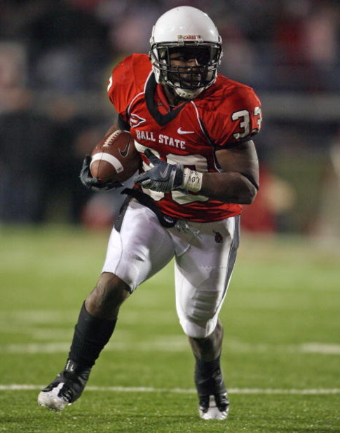 MUNCIE, IN - NOVEMBER 25:  MiQuale Lewis #33 of the Ball State Cardinals runs with the ball during the Mid-American Conference (MAC) game against the Western Michigan Broncos at Scheumann Stadium November 25, 2008 in Muncie, Indiana.  (Photo by Andy Lyons