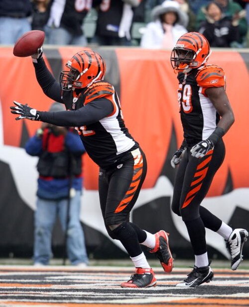CINCINNATI - NOVEMBER 16: Frostee Rucker #92 and Brandon Johnson #59 of the Cincinnati Bengals celebrate a fumble recovery by Rucker during the NFL game against the Philadelphia Eagles at Paul Brown Stadium on November 16, 2008 in Cincinnati, Ohio. The g
