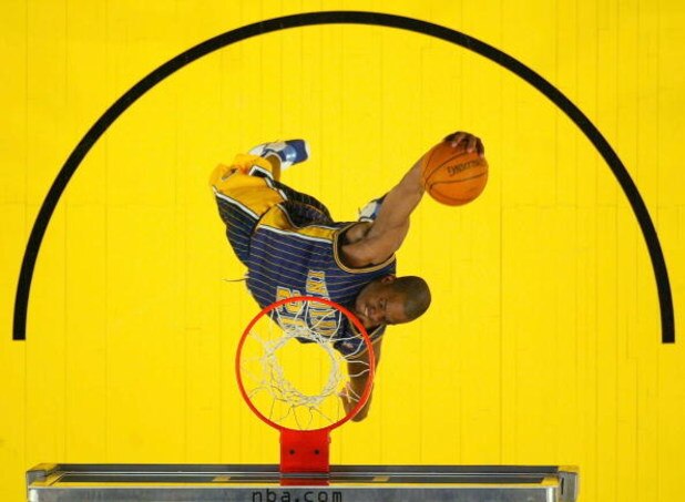 LOS ANGELES - FEBRUARY 14: Fred Jones #20 of the Indiana Pacers goes up for a dunk in route to winning the Sprite Rising Stars Slam Dunk Competition, part of the 53rd NBA All-Star weekend on February 14, 2004 at the Staples Center in Los Angeles, Califo