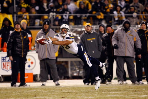 PITTSBURGH - JANUARY 11:  Vincent Jackson #83 of  the San Diego Chargers attempts to make a play on a pass that was originally called a reception but was over turned on a coaches challenge against the Pittsburgh Steelers during their AFC Divisional Playof
