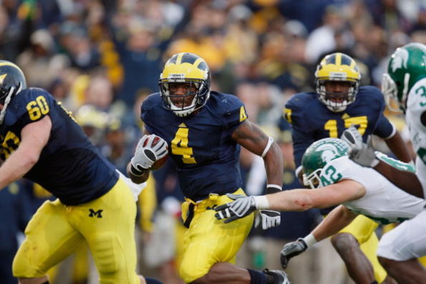 ANN ARBOR, MI - OCTOBER 25:  Brandon Minor #4 of the Michigan Wolverines runs with the ball during the game against the Michigan State Spartans on October 25, 2008 at Michigan Stadium in Ann Arbor, Michigan. Michigan State won the game 35-21. (Photo by Gr