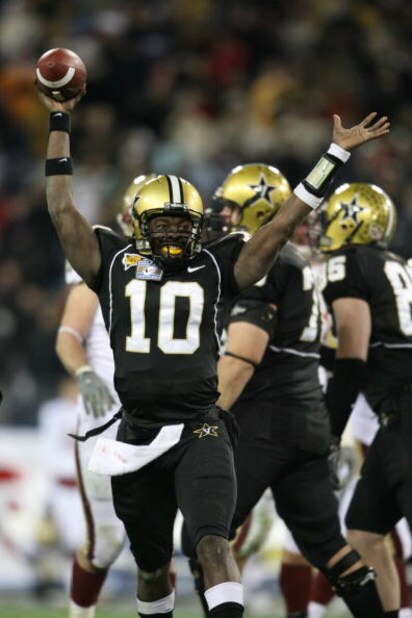 NASHVILLE, TN - DECEMBER 31: Larry Smith #10 of the Vanderbilt Commodores celebrates against the Boston College Eagles during the Gaylord Hotels Music City Bowl at LP Field on December 31, 2008 in Nashville, Tennessee. (Photo by Andy Lyons/Getty Images)