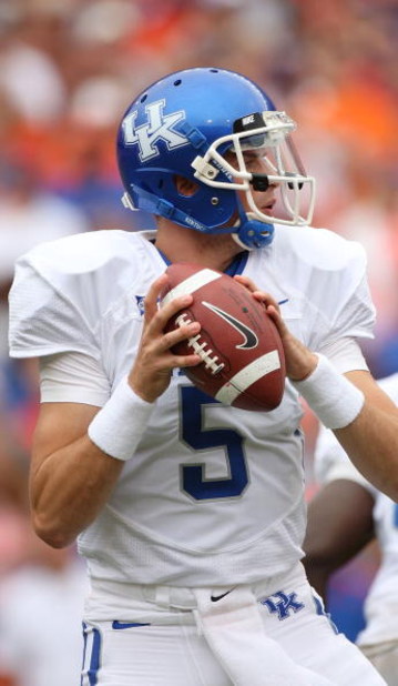 GAINESVILLE, FL - OCTOBER 25:  Quarterback Mike Hartline #5 of the Kentucky Wildcats drops back to pass in a game against the Florida Gators at Ben Hill Griffin Stadium on October 25, 2008 in Gainesville, Florida.  (Photo by Sam Greenwood/Getty Images)