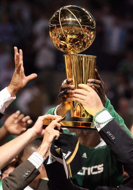 BOSTON - JUNE 17:  The Boston Celtics celebrate with the Larry O'Brien Trophy after defeating the Los Angeles Lakers in Game Five of the 2008 NBA Finals on June 17, 2008 at TD Banknorth Garden in Boston, Massachusetts. NOTE TO USER: User expressly acknowl
