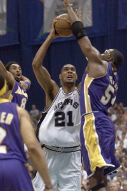 19 May 2001:  Tim Duncan #21of the San Antonio Spurs shoots over Hoarce Grant #54 of the Los Angeles Lakers during game one of the Western Conference Finals at the Alamo Dome in San Antonio, Texas. DIGITAL IMAGE Mandatory Credit: Jed Jacobsohn/ALLSPORT  N