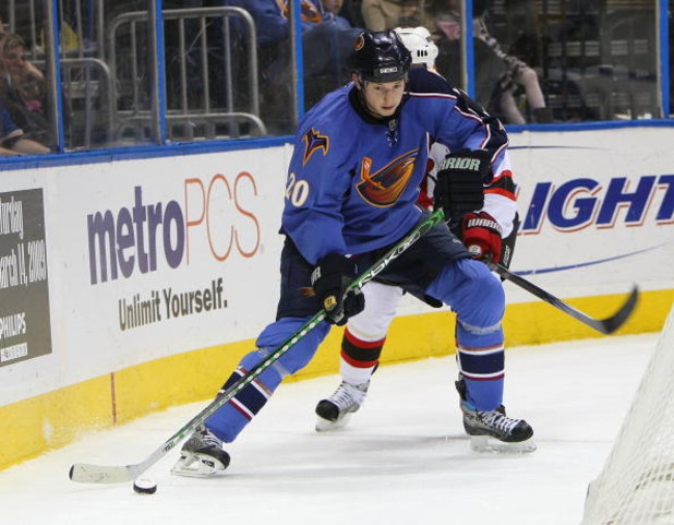 ATLANTA - FEBRUARY 06: Colby Armstrong #20 of the Atlanta Thrashers skates against the New Jersey Devils on February 6, 2009 at the Philips Arena in Atlanta, Georgia. (Photo by Bruce Bennett/Getty Images)