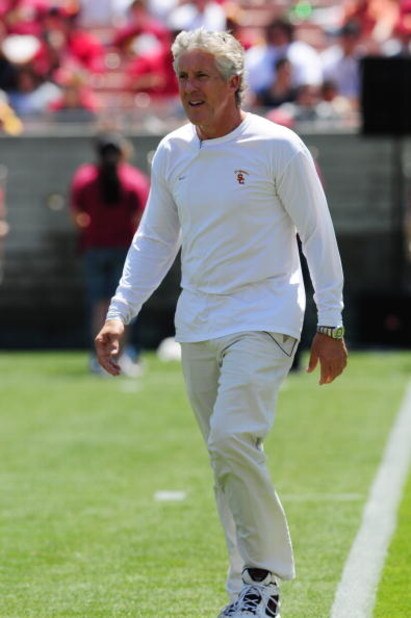 LOS ANGELES, CA - APRIL 25: Head coach Pete Carroll of the USC Trojans walks on the field during the spring game on April 25, 2009 at the Los Angeles Memorial Coliseum in Los Angeles, California. (Photo by Matt Kincaid/Getty Images)