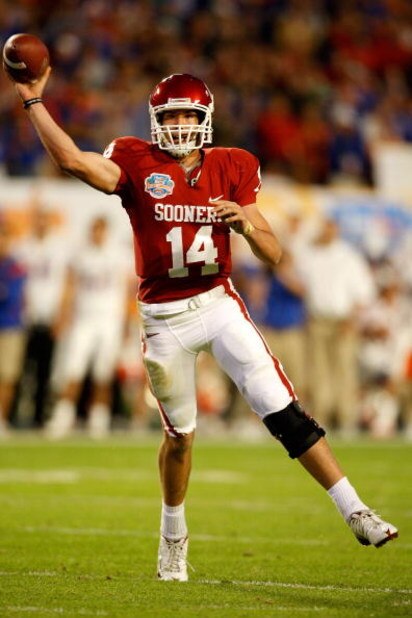 MIAMI - JANUARY 08: Sam Bradford #14 of the Oklahoma Sooners throws a passagainst the Florida Gators during the FedEx BCS National Championship game at Dolphin Stadium on January 8, 2009 in Miami, Florida. (Photo by Marc Serota/Getty Images)