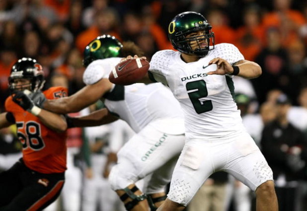 CORVALLIS, OR - NOVEMBER 29: Quarterback Jeremiah Masoli #2 of the Oregon Ducks throws a pass against the Oregon State Beavers at Reser Stadium on November 29, 2008 in Corvalis, Oregon. (Photo by Jonathan Ferrey/Getty Images)