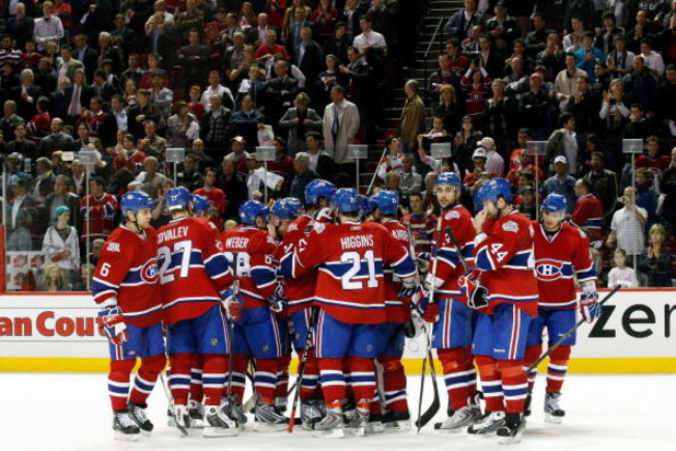 MONTREAL- APRIL 22:  Members of the Montreal Canadiens huddle after being defeated by the Boston Bruins 4-1 after Game Four of the Eastern Conference Quarterfinals of the 2009 Stanley Cup Playoffs at the Bell Centre on April 22, 2009 in Montreal, Quebec, 