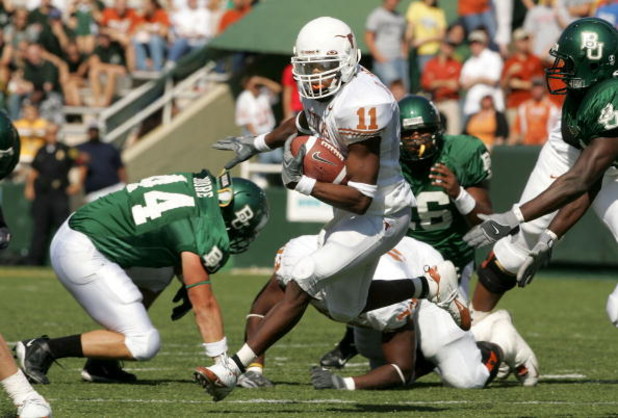 WACO, TX - NOVEMBER 5:  Running back Romance Taylor #11 of the Texas Longhorns carries the ball against the Baylor Bears on November 5, 2005 at Floyd Casey Stadium in Waco, Texas. Texas defeated Baylor 62-0.  (Photo by Stephen Dunn /Getty Images)
