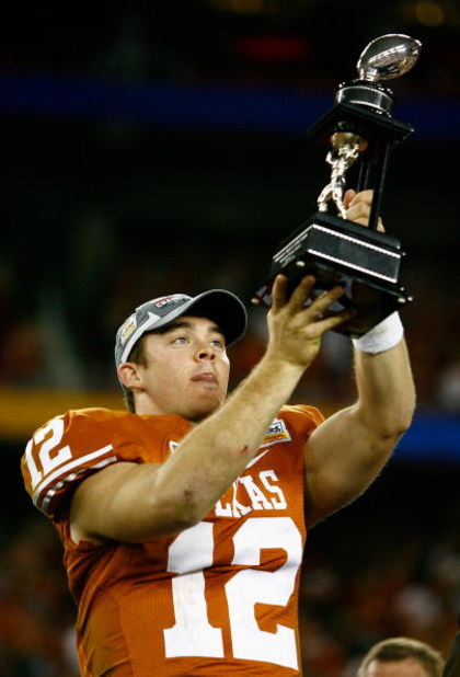 GLENDALE, AZ - JANUARY 05:  Quarterback Colt McCoy #12 of the Texas Longhorns celebrates after defeating the Ohio State Buckeyes in the Tostitos Fiesta Bowl Game on January 5, 2009 at University of Phoenix Stadium in Glendale, Arizona. The Longhorns defea