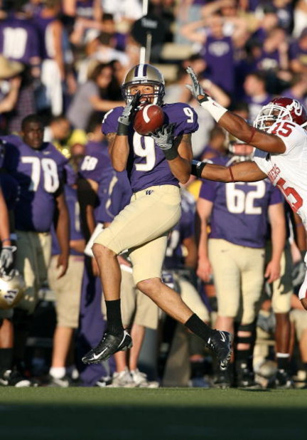 SEATTLE - SEPTEMBER 13:  Devin Aguilar #9 of the Washington Huskies catches the ball during the game against the Oklahoma Sooners on September 13, 2008 at Husky Stadium in Seattle, Washington. The Sooners defeated the Huskies 55-14.(Photo by Otto Greule J