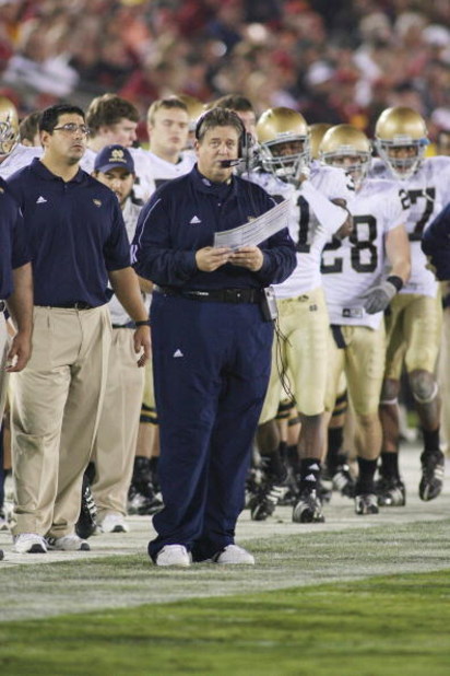 LOS ANGELES - NOVEMBER 29:  Head coach Charlie Weis of the Notre Dame Fighting Irish looks on from the sideline against the USC Trojans on November 29, 2008 at the Los Angeles Memorial Coliseum in Los Angeles, California.  USC won 38-3.  (Photo by Jeff Go