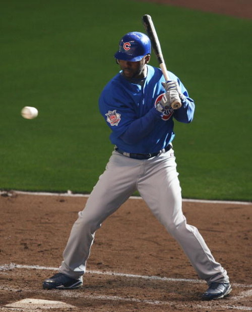 MILWAUKEE - APRIL 10: Milton Bradley #21 of the Chicago Cubs looks at a high pitch during the Opening Day game against the Milwaukee Brewers  on April 10, 2009 at Miller Park in Milwaukee, Wisconsin. (Photo by Jonathan Daniel/Getty Images)