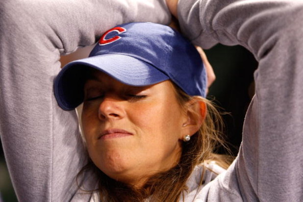 CHICAGO - OCTOBER 02:  Leela Sullivan, a fan of the Chicago Cubs, looks on dejected as they Cubs lost 10-3 against the Los Angeles Dodgers in Game Two of the NLDS during the 2008 MLB Playoffs at Wrigley Field on October 2, 2008 in Chicago, Illinois.  (Pho