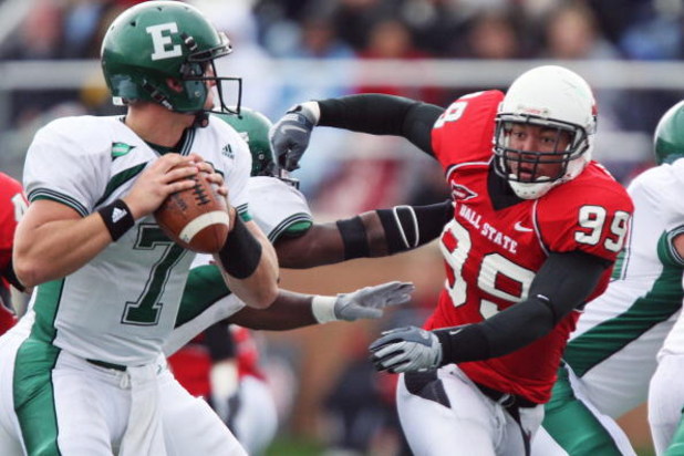 MUNCIE, IN - OCTOBER 25:  Defensive lineman Kenny Meeks #99 of the Ball State Cardinals pressures the Eastern Michigan Eagles quarterback on October 25, 2008 at Scheumann Stadium in Muncie, Indiana.  (Photo by Jamie Sabau/Getty Images)