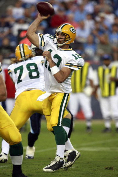 NASHVILLE, TN - SEPTEMBER 3: Aaron Rodgers #12 of the Green Bay Packers throws downfield against the Tennessee Titans during a preseason NFL game at LP Field on September 3, 2009 in Nashville, Tennessee. (Photo by Joe Murphy/Getty Images)