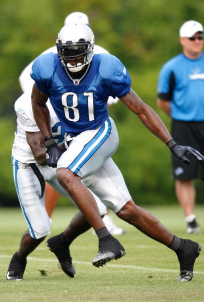ALLEN PARK, MI - AUGUST 04:  Calvin Johnson #81 of the Detroit Lions runs a pass route during training camp at the Detroit Lions Headquarters and Training Facility on August 4, 2009 in Allen Park, Michigan.  (Photo by Gregory Shamus/Getty Images)