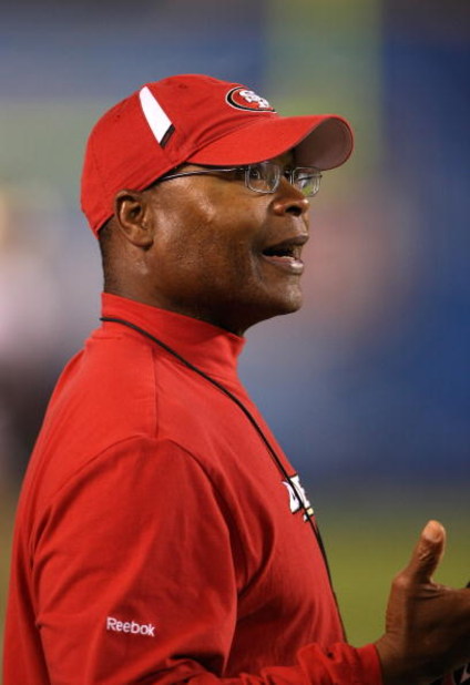 SAN DIEGO - SEPTEMBER 4: Head coach Mike Singletary of the San Francisco 49ers talks on the sidelines during the game with the San Diego Chargers  on September 4, 2009 at Qualcomm Stadium in San Diego, California.   The Chargers won 26-7.  (Photo by Steph