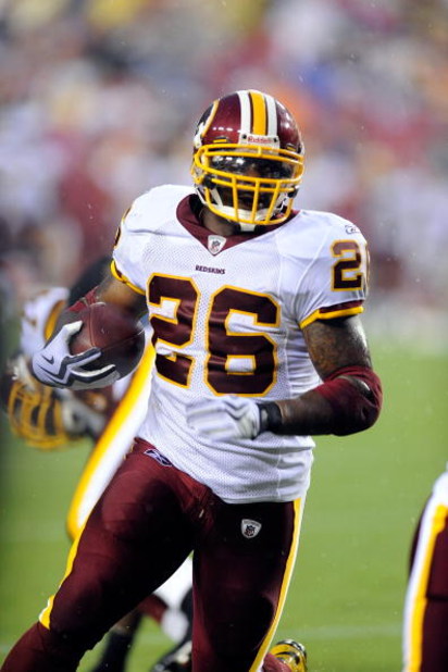 LANDOVER, MD - AUGUST 22:  Clinton Portis #26 of the Washington Redskins rushes the ball against the Pittsburgh Steelers at Fed Ex Field on August 22, 2009 in Landover, Maryland.  (Photo by Greg Fiume/Getty Images)