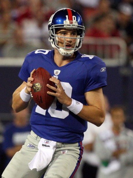 EAST RUTHERFORD, NJ - AUGUST 29:  Eli Manning #10 of the New York Giants looks to throw a pass against the New York Jets on August 29, 2009 at Giants Stadium in East Rutherford, New Jersey.  (Photo by Jim McIsaac/Getty Images)