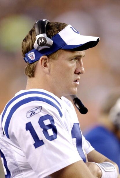 CINCINNATI, OH - AUGUST 3: Quarterback Peyton Manning #18 of the Indianapolis Colts watches the action against the Cincinnati Bengals during the preseason game on August 3, 2009 at Paul Brown Stadium in Cincinnati, Ohio. (Photo by Andy Lyons/Getty Image