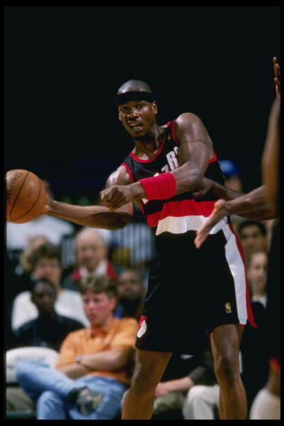 8 Apr 1997:  Clifford Robinson of the Portland Trailblazers throws the ball during their 87-82 loss to the Dallas Mavericks at Reunion Arena in Dallas, Texas.  Mandatory Credit: Stephen Dunn  /Allsport