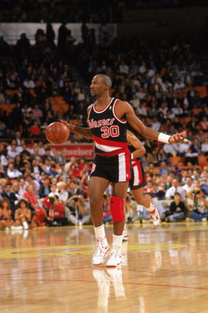 LOS ANGELES - 1990:  Terry Porter #30 of the Portland Trail Blazers moves the ball against the Los Angeles Lakers during the 1989-1990 NBA season game at the Great Western Forum in Los Angeles, California.  (Photo by Mike Powell/Getty Images) 