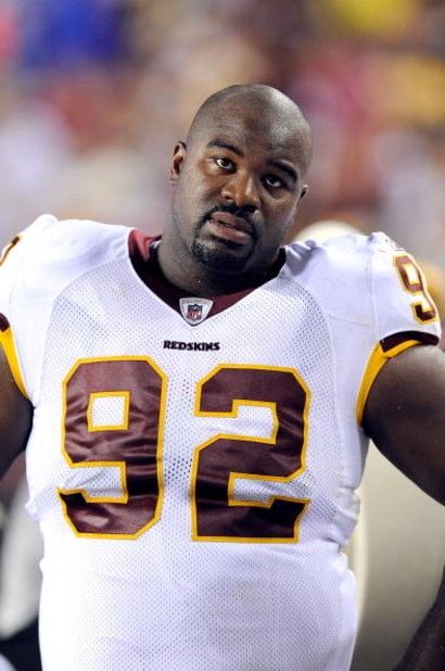 LANDOVER, MD - AUGUST 22:  Albert Haynesworth #92 of the Washington Redskins watches the game against the Pittsburgh Steelers at Fed Ex Field on August 22, 2009 in Landover, Maryland.  (Photo by Greg Fiume/Getty Images)