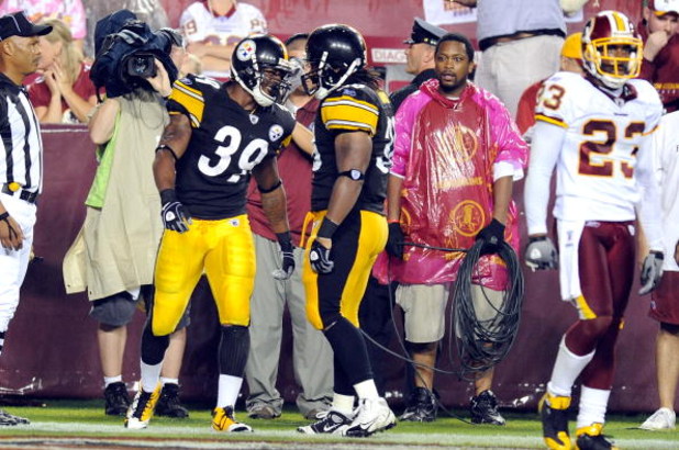 LANDOVER, MD - AUGUST 22:  Willie Parker #39 of the Pittsburgh Steelers celebrates with Carey Davis #38 after scoring a touchdown against the Washington Redskins at Fed Ex Field on August 22, 2009 in Landover, Maryland.  (Photo by Greg Fiume/Getty Images)