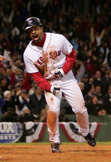 BOSTON - OCTOBER 17:  Dave Roberts #31 of the Boston Red Sox celebrates after scoring the game-tying run on a single by Bill Mueller #11 in the ninth inning against the New York Yankees during game four of the American League Championship Series on Octobe