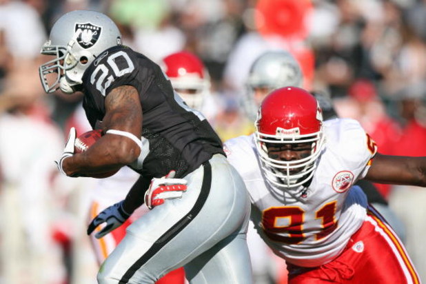OAKLAND, CA - NOVEMBER 30:  Devard Darling #81 of the Kansas City Chiefs tackles Darren McFadden #20 of the Oakland Raiders during an NFL game on November 30, 2008 at the Oakland-Alameda County Coliseum in Oakland, California. (Photo by Jed Jacobsohn/Gett