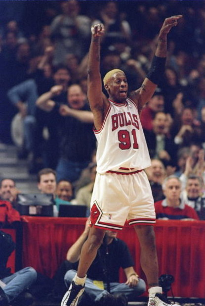 27 Dec 1997:  Forward Dennis Rodman of the Chicago Bulls looks on during a game against the Atlanta Hawks at the United Center in Chicago, Illinois.  The Bulls won the game, 97-90. Mandatory Credit: Matthew Stockman  /Allsport