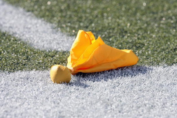 SEATTLE - SEPTEMBER 23:  A penalty flag lies on the field during the Seattle Seahawks game against the Cincinnati Bengals at Qwest Field on September 23, 2007 in Seattle, Washington. The Seahawks won 24-21. (Photo by Otto Greule Jr/Getty Images)