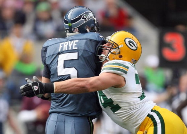 SEATTLE - OCTOBER 12: Aaron Kampman #74 of the Green Bay Packers tackles quarterback Charlie Frye #5 of the Seattle Seahawks on October 12, 2008 at Qwest Field in Seattle, Washington. The Packers defeated the Seahawks 27-17. (Photo by Otto Greule Jr./Get