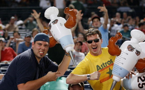 ATLANTA - AUGUST 16: Fans Ray Kruse (L) and Andrew Fitzgerald (R) have a playful moment with blow-up syringes during the game between the Atlanta Braves and the San Francisco Giants on August 16, 2007 at Turner Field in Atlanta, Georgia.  (Photo by Mike Z