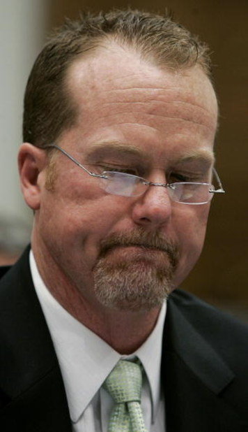 WASHINGTON - MARCH 17:  Former St. Louis Cardinal Mark McGwire tries to hold back tears while testifying during a House Committe session investigating Major League Baseball's effort to eradicate steroid use on Capital Hill March 17, 2005 in Washington, DC