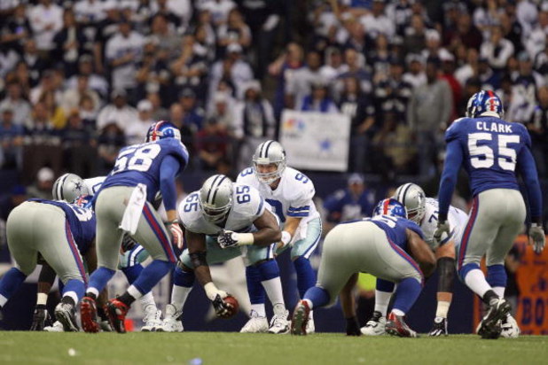 IRVING, TX - DECEMBER 14: Quarterback Tony Romo #9 of the Dallas Cowboys calls the play at the line of scrimmage against the New York Giants at Texas Stadium on December 14, 2008 in Irving, Texas. (Photo by Ronald Martinez/Getty Images)