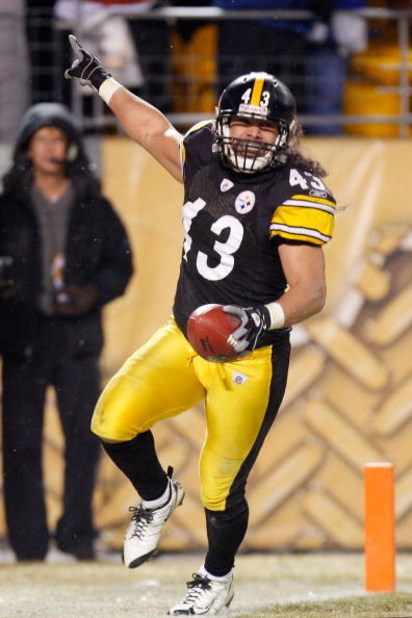 PITTSBURGH - JANUARY 18:  Safety Troy Polamalu #43 of the Pittsburgh Steelers celebrates his touchdown against the Baltimore Ravens during the fourth quarter of the AFC championship game on January 18, 2009 at Heinz Field in Pittsburgh, Pennsylvania.  (Ph